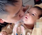 爸爸隔保鲜膜狂亲新生宝宝 满满爱意！